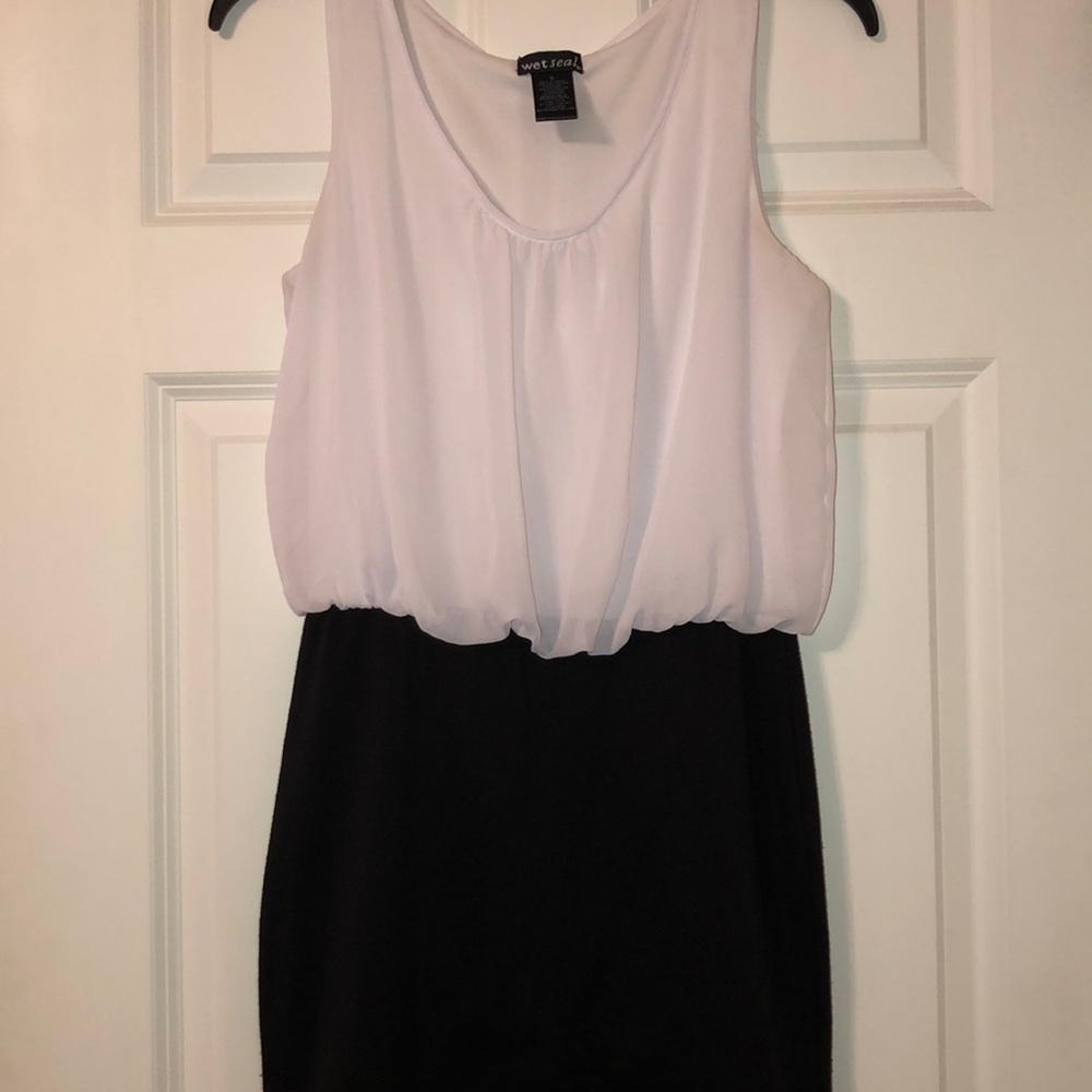 Form fitted fancy black & white dress.